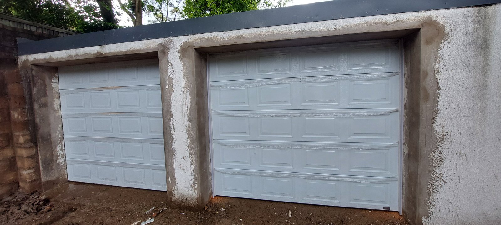 Double Garage Door - White Panelled